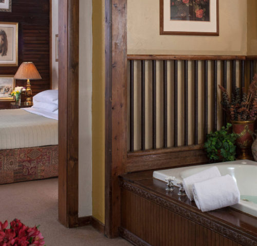 a suite and bath at Inn at Lake Joseph