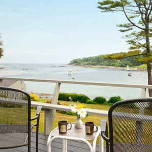 Chairs on private deck with water view