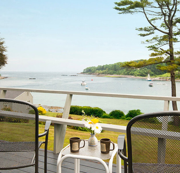 Chairs on private deck with water view